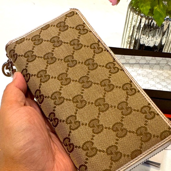 Authentic Gucci Tan Monogram Zippy Wallet - Picture 7 of 15